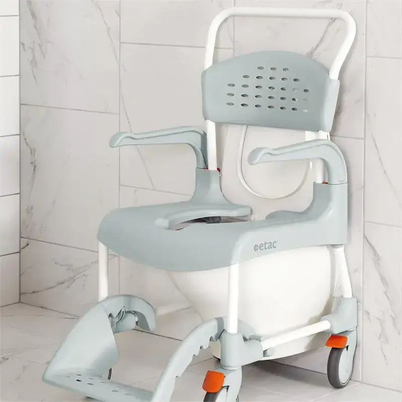 Etac Clean Rolling Shower Commode Chair from reliable ramps green option on the toilet