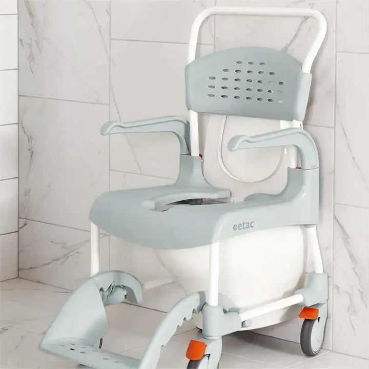 Etac Clean Rolling Shower Commode Chair from reliable ramps green option on the toilet