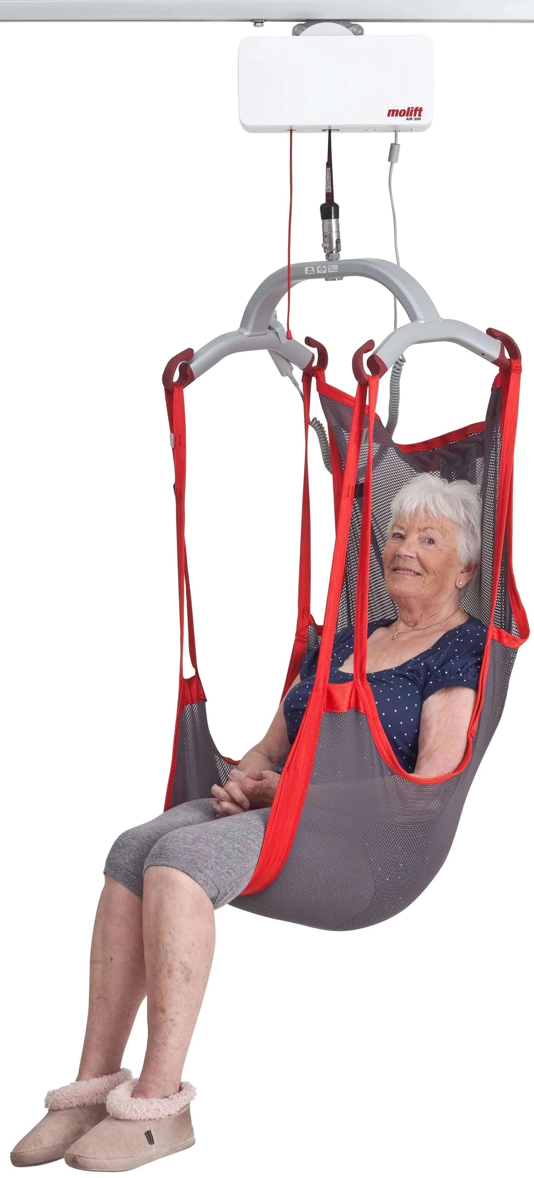 Molift - RgoSling Comfort HighBack Patient Sling being used by a patient in a lift