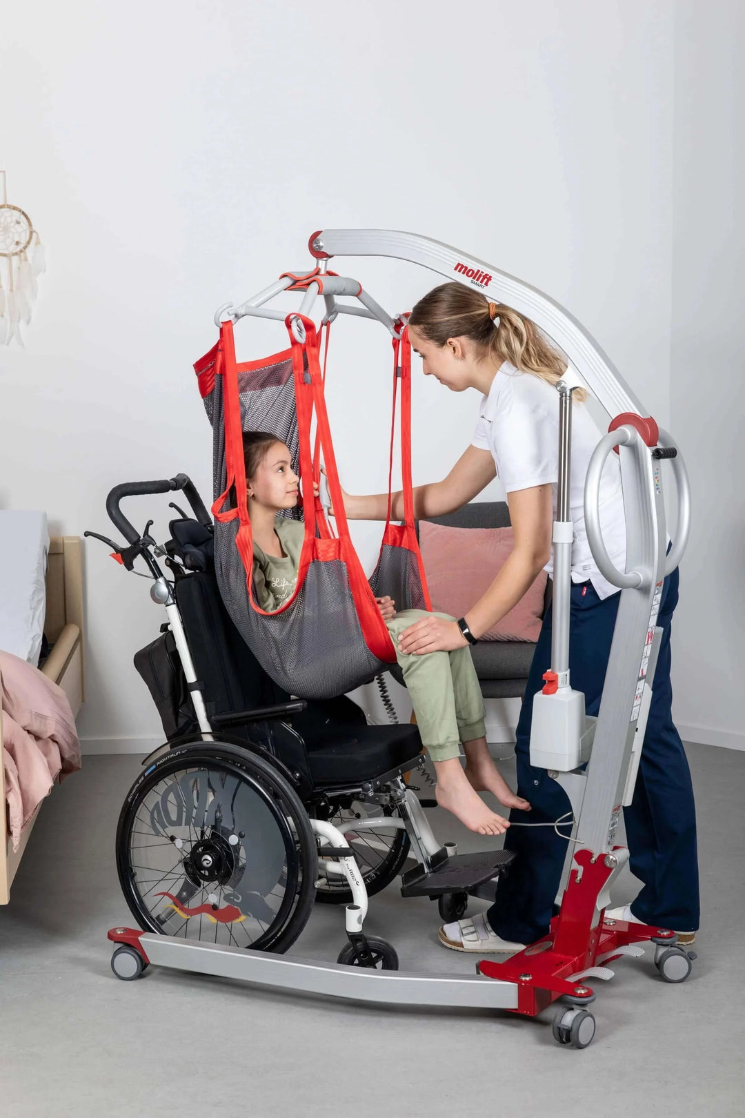 Molift - Smart 150 Patient Lift being used by a patient and their nurse