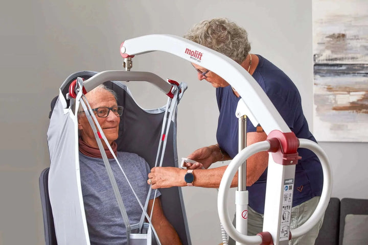 Molift - RgoSling Highback Padded Patient Sling being used by a patient and their nurse