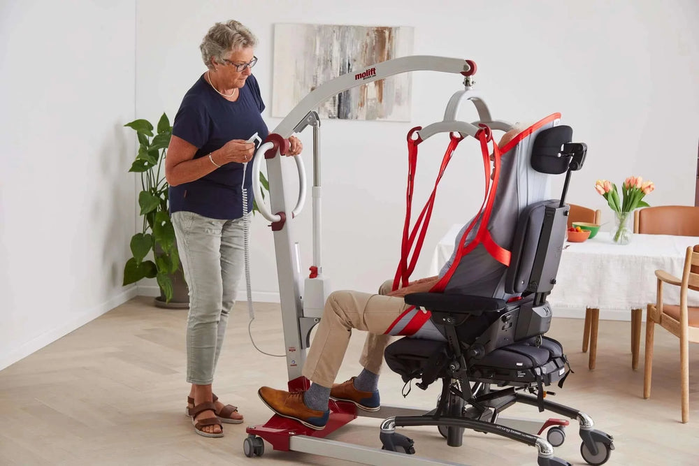 Molift - RgoSling Highback Padded Patient Sling being used by a patient and their nurse