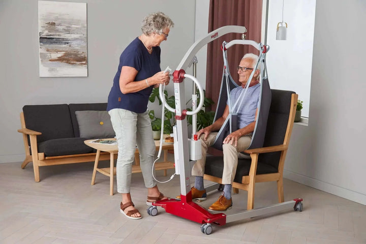 Molift - RgoSling MediumBack Padded Patient Sling being used by a patient and their nurse