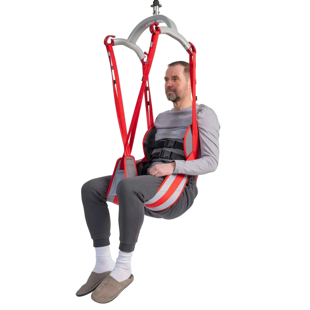 Molift - RgoSling Toilet LowBack Padded Patient Sling being used by a patient