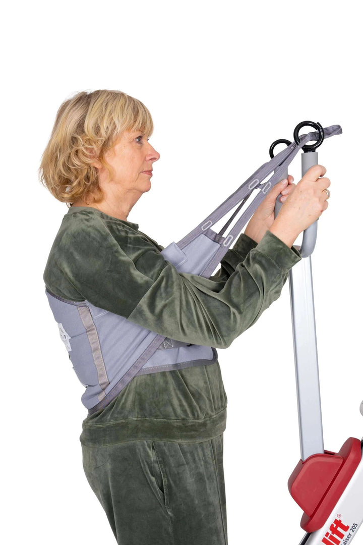 Molift - Quick Raiser 205 Sit-To-Stand Patient Lift - patient using the lift
