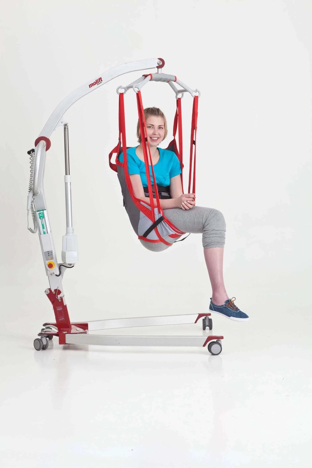 Molift - RgoSling Amputee Mediumback Padded Patient Sling being used by a patient in a lift