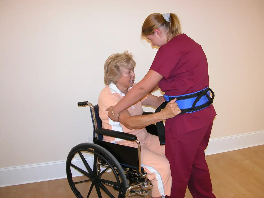 The bestcare handi belt from reliable ramps being used by a patient holding onto the nurse
