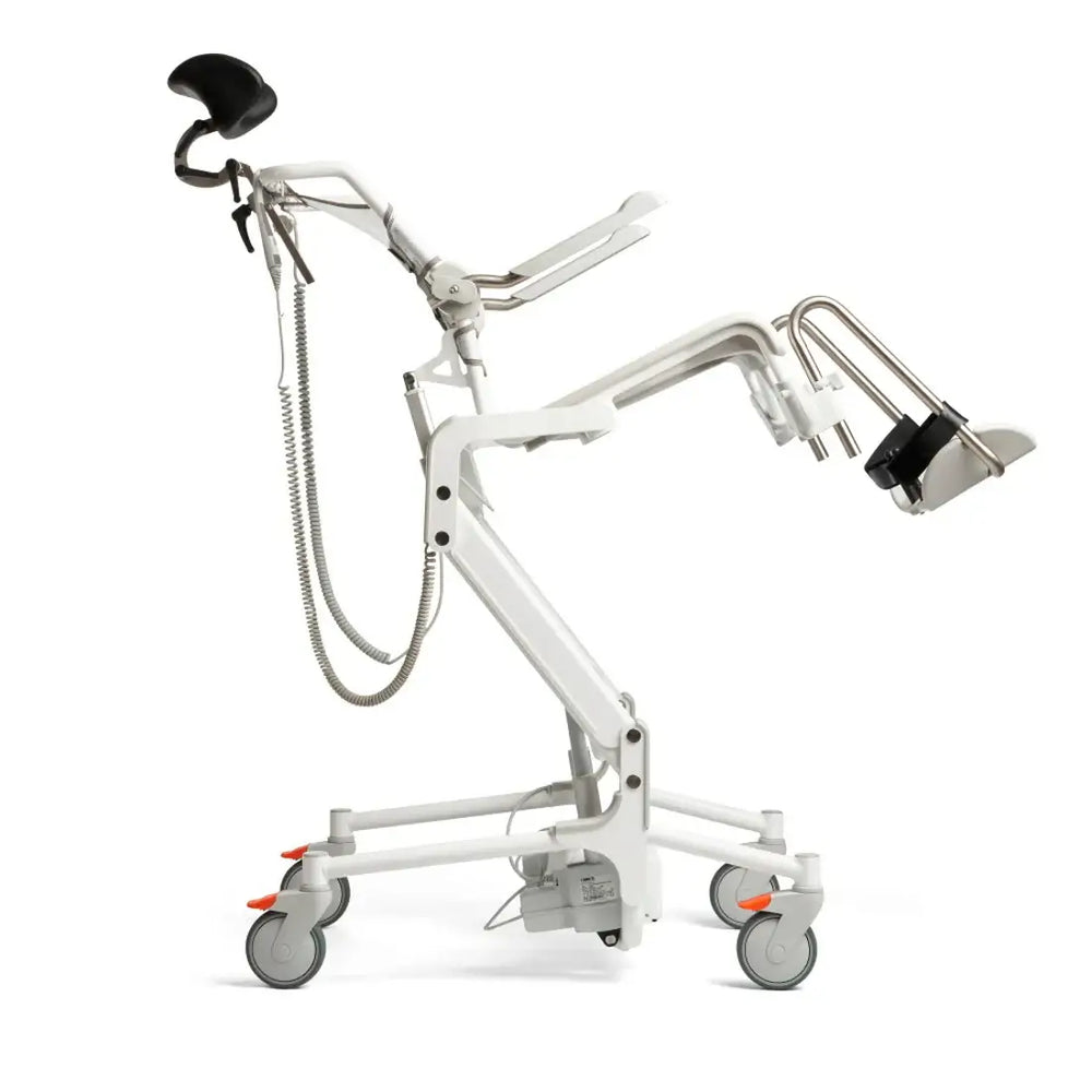 Medical examination table with adjustable arm and lamp on a white background
