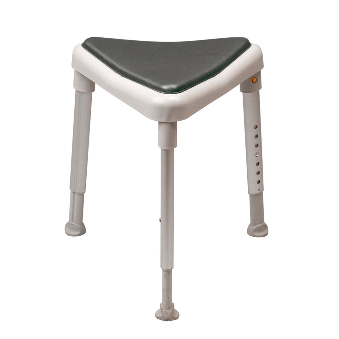 Bath stool with green seat and white legs on a white background