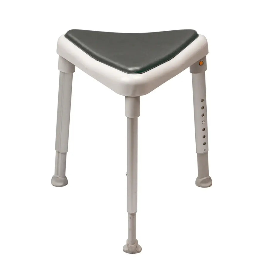 Bath stool with green seat and white legs on a white background