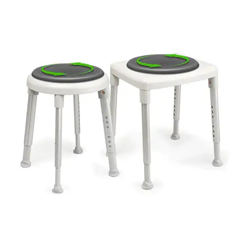 Two white stools with gray seats and green accents on a white background