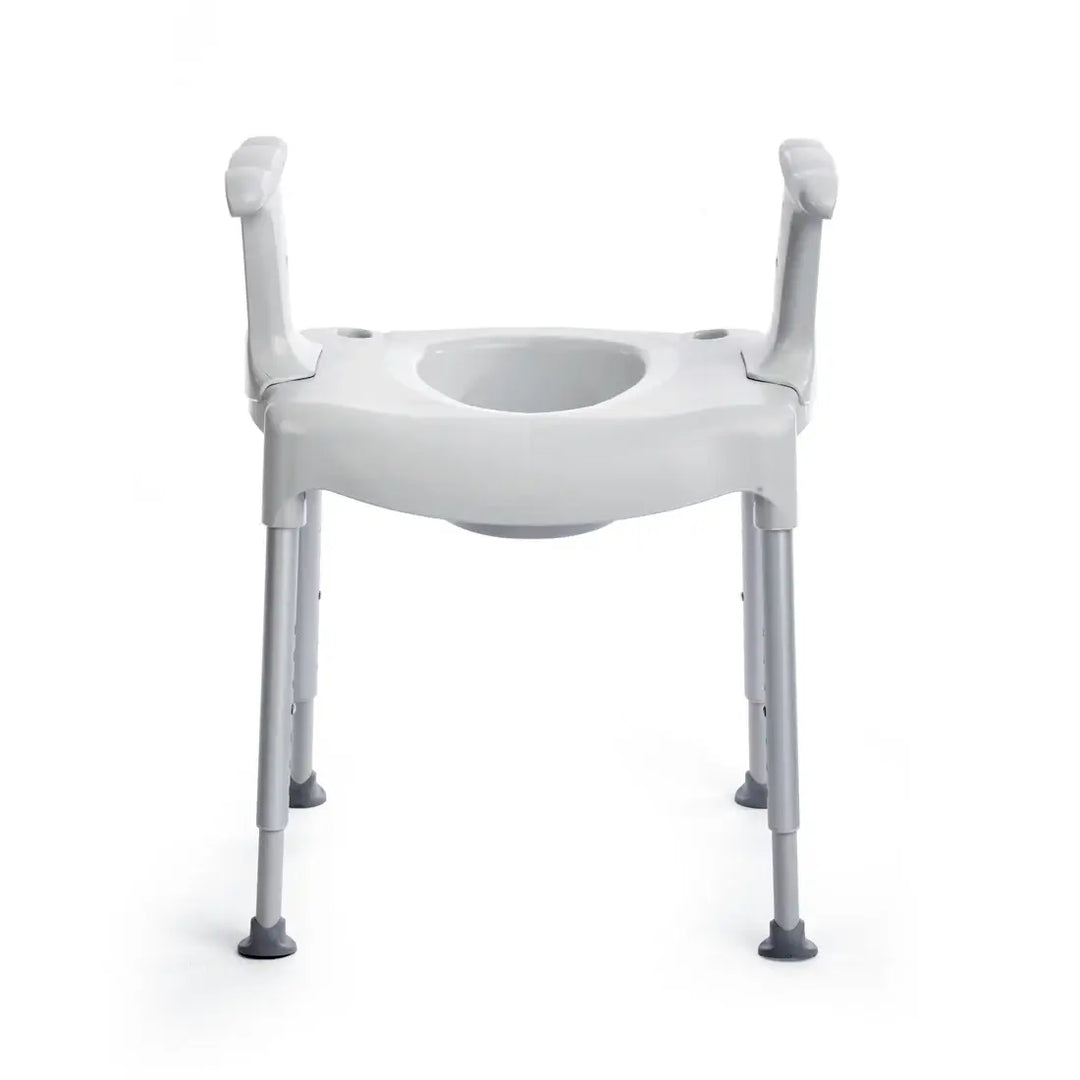 White commode chair with adjustable legs on a white background