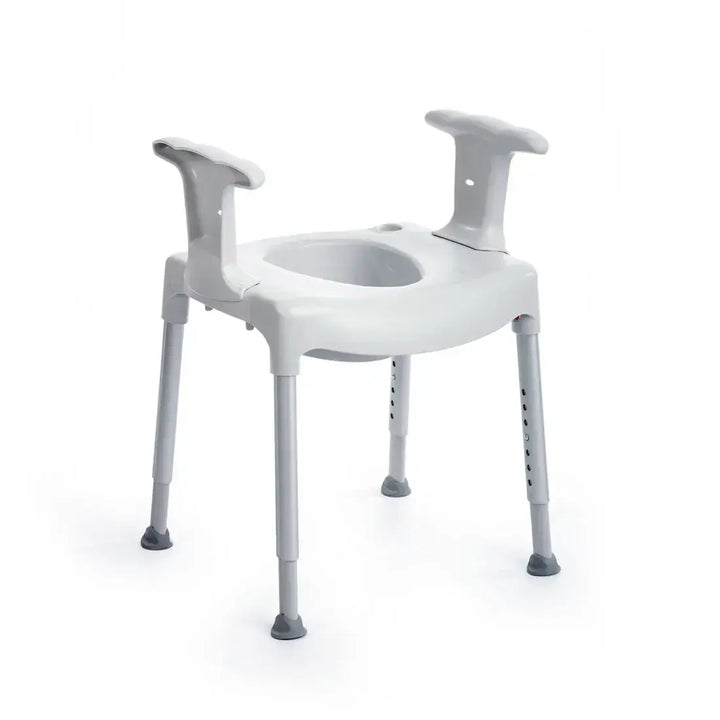 White commode chair with adjustable legs on a white background
