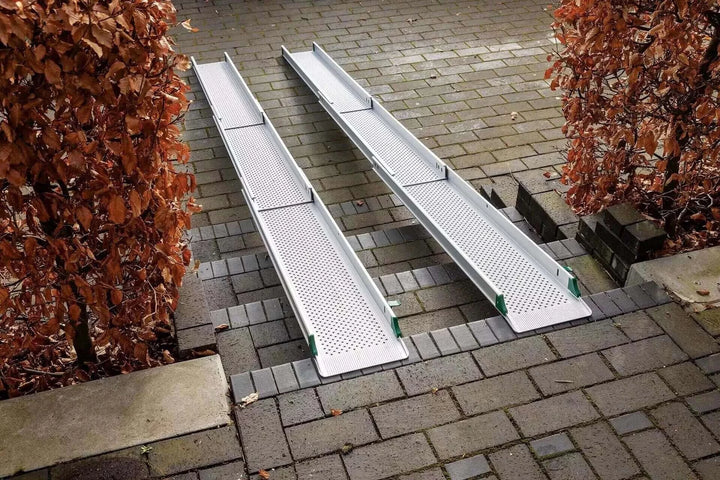 Guldmann - Stepless Telescopic Portable Wheelchair Ramp setup outside a residence