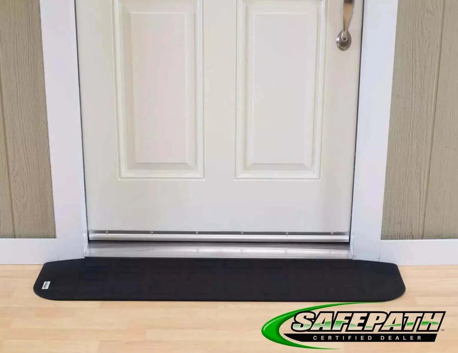 SafePath - EZ Edge Transition Rubber Threshold Ramp - 46" Width being used in front of a white door