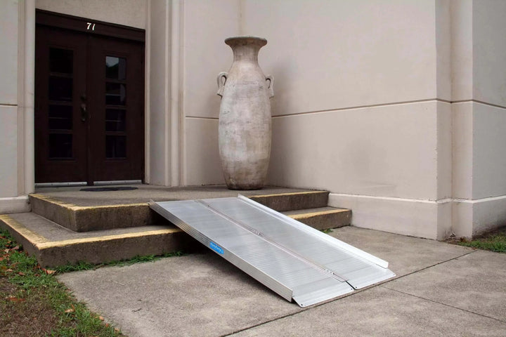 AlumiLite Folding Wheelchair Curb Ramp - in front of two entrance