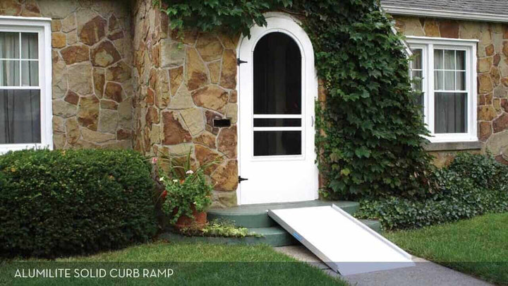 AlumiRamp - AlumiLite Solid Aluminum Curb Wheelchair Ramp - being used in front of a house