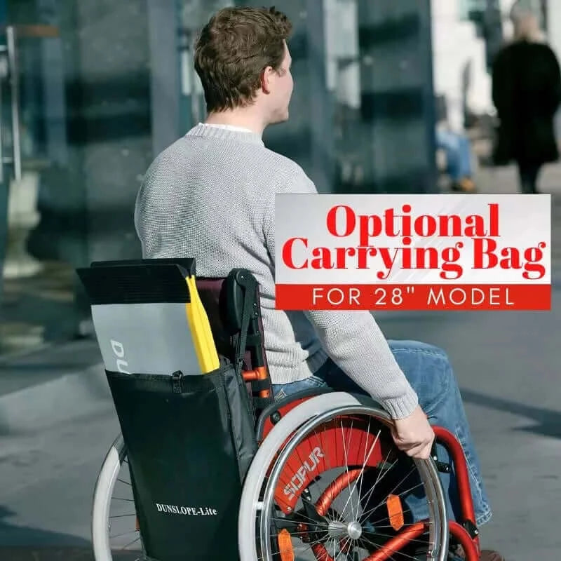 Guldmann - Stepless Single Folding Lite Wheelchair Ramp being held on the back of a wheelchair showing the lightweight and portability