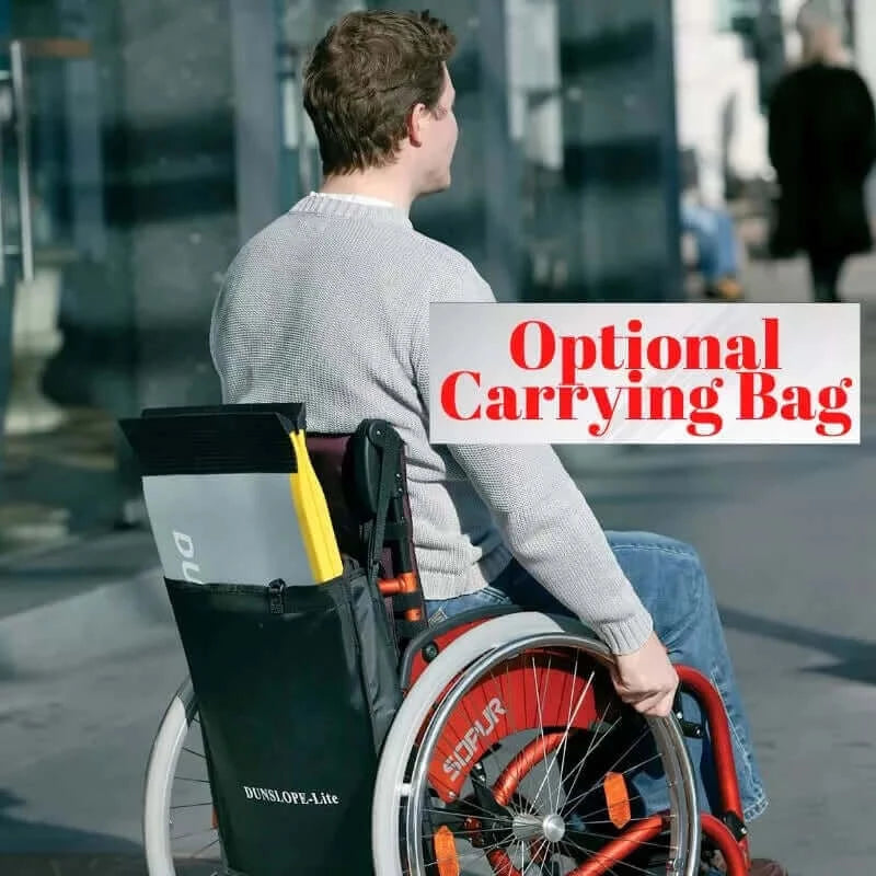 Guldmann - Stepless Multi Folding Lite Wheelchair Ramp picture that shows the ramp on the back of a wheelchair saying the bag carrier is available for purchase