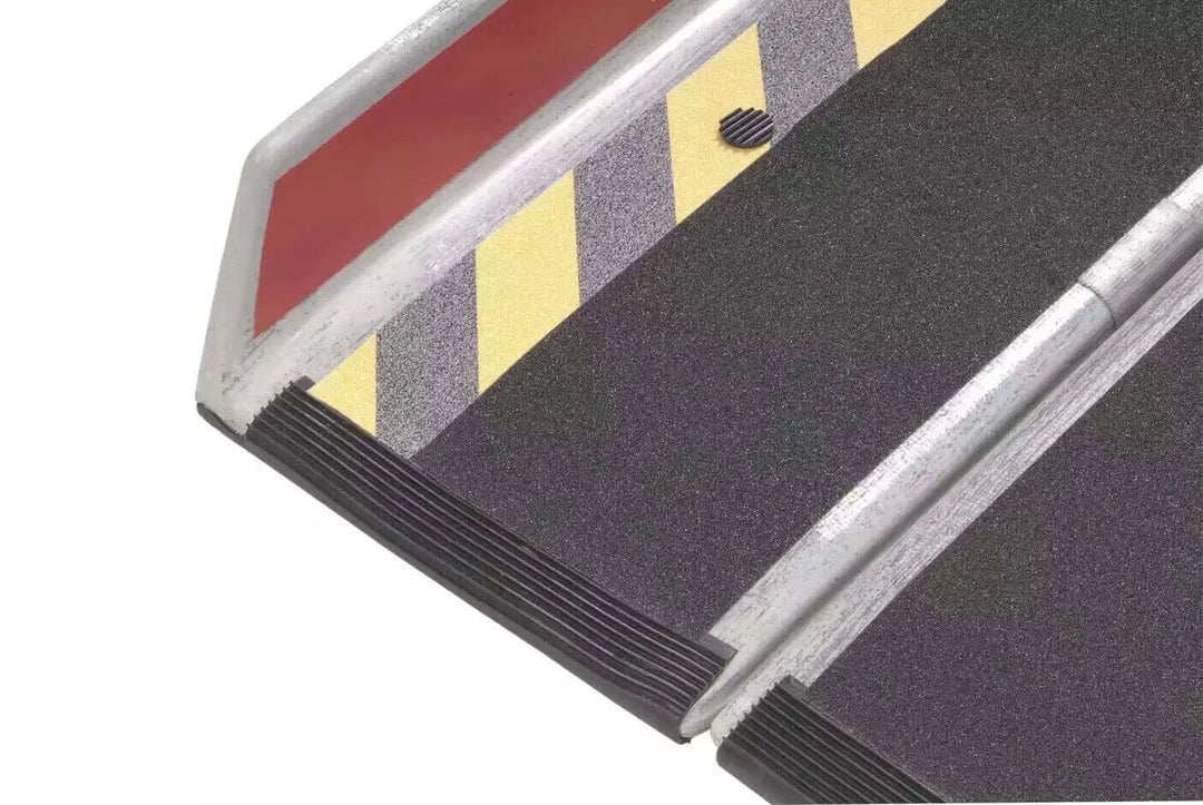 DECPAC - Fiberglass Portable Wheelchair Van Ramp + Edge Barrier - 5'5" - zoomed in view of the end of the ramp with a white background