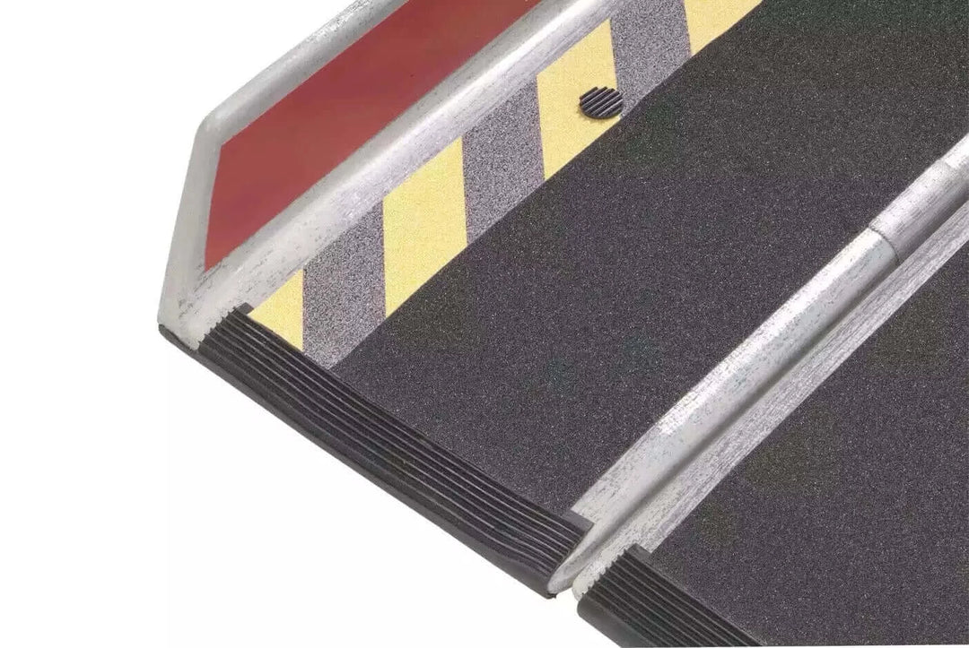 DECPAC - Fiberglass Portable Wheelchair Van Ramp + Edge Barrier - 6'6" - zoomed in view of the end of the ramp with a white background