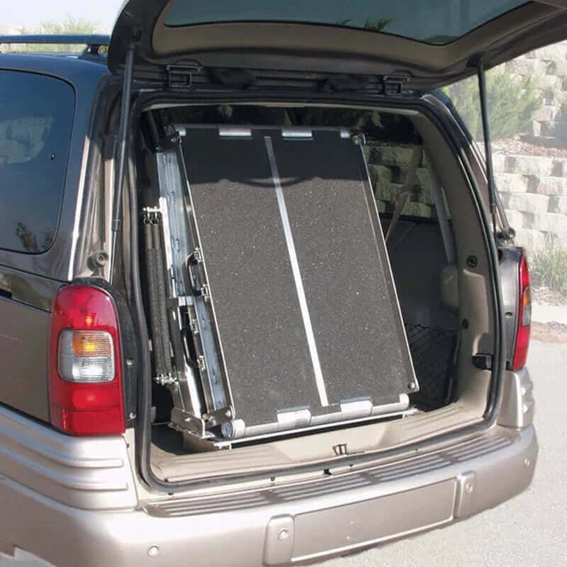 PVI - Conversion Kit for Rear Door Mountable Van Wheelchair Ramp folded up in the back of a van