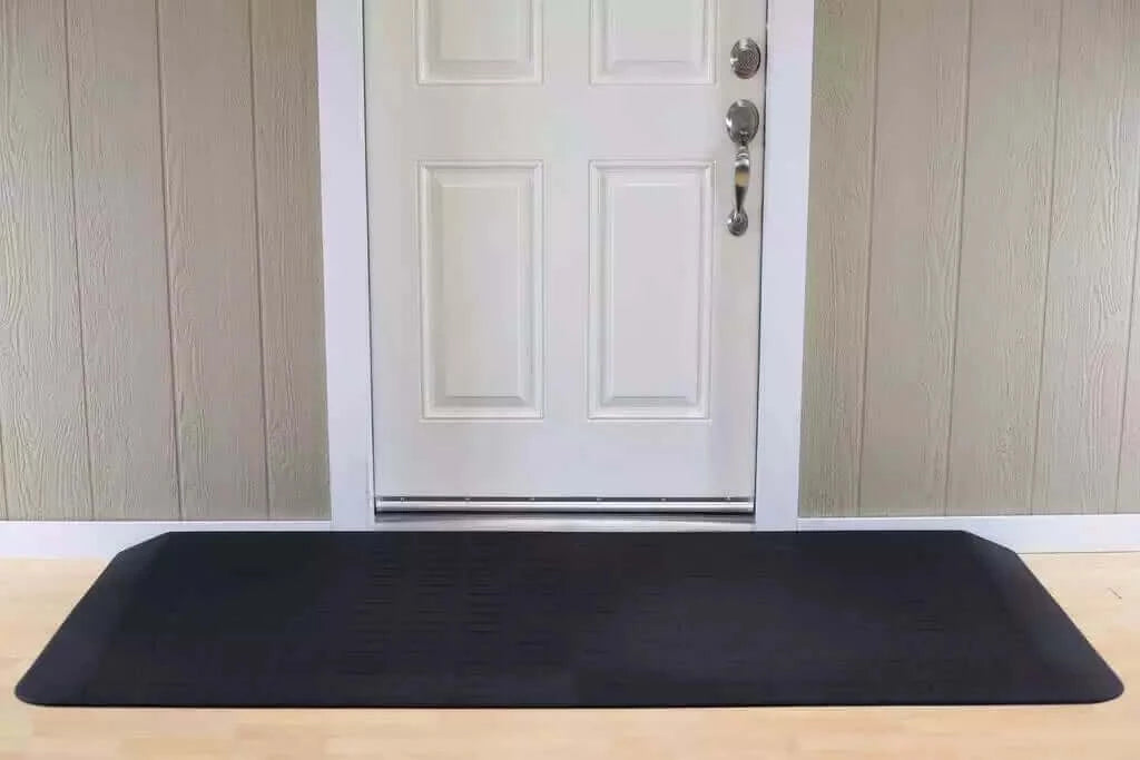 SafePath - EZ Edge Transition Rubber Threshold Ramp - 82" Width being used in front of a white door