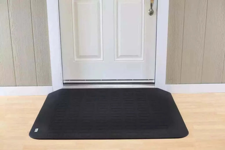 SafePath - EZ Edge Transition Rubber Threshold Ramp - 46" Width being used in front of a white door