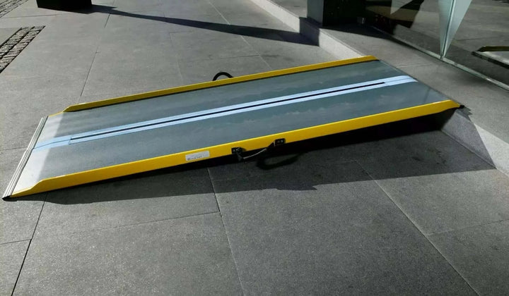 Guldmann - Stepless Single Folding Lite Wheelchair Ramp set up outside