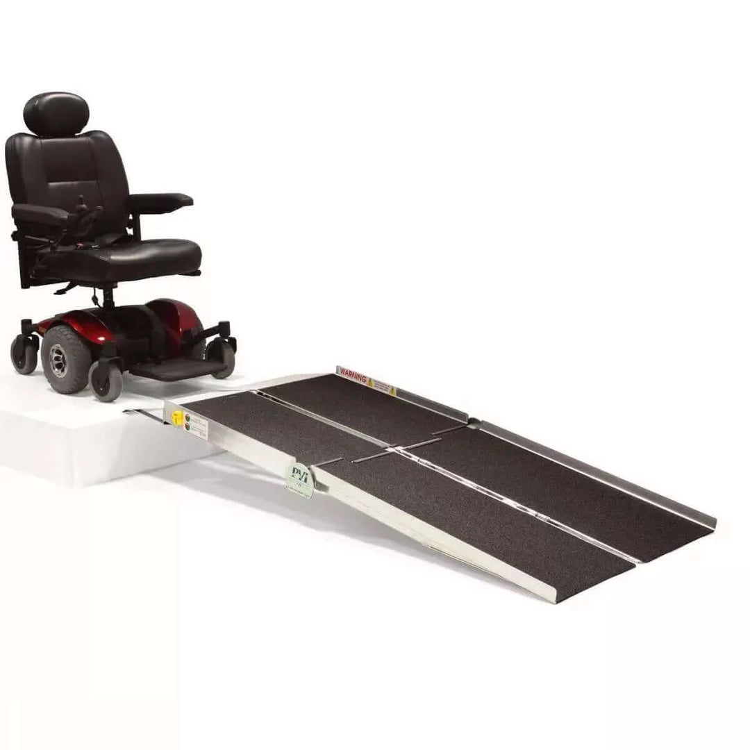 PVI - Aluminum Multi-Fold Rear Door Reach Portable Van Wheelchair Ramp with a mobility scooter and white background