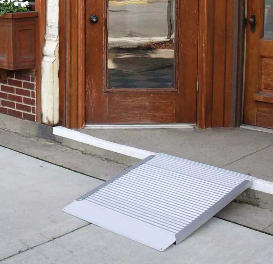 AlumiRamp - Aluminum Threshold Ramp for Wheelchairs - used on a one step entrance of a home