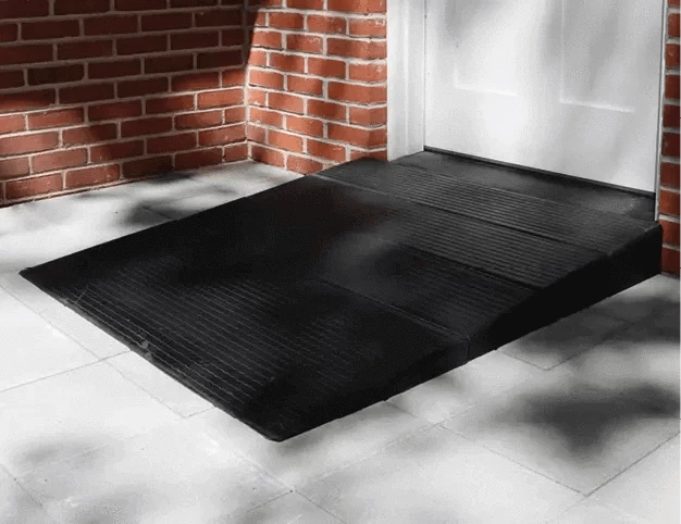 National Ramp - Approach Series Rubber Threshold Ramp for Wheelchairs - shown in front of a main entrance