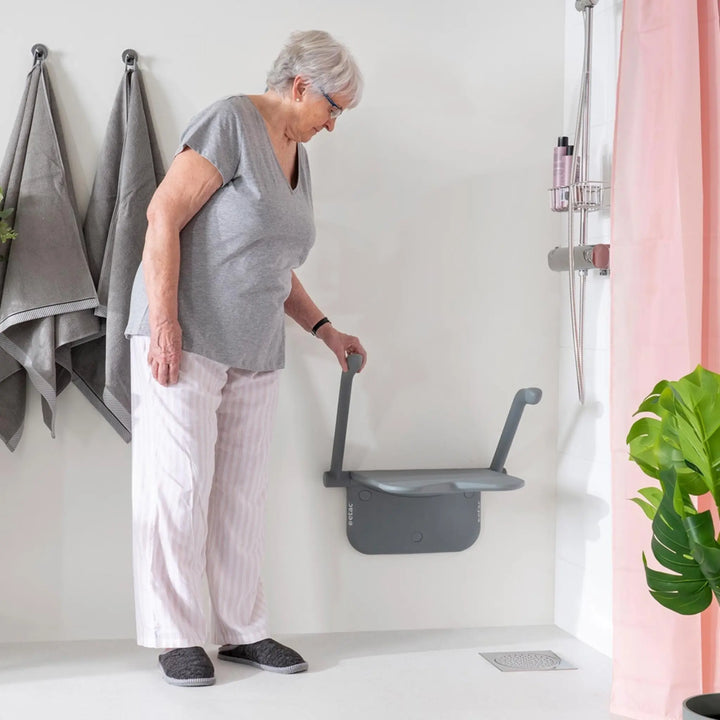 ETAC relax shower seat with lady holding it