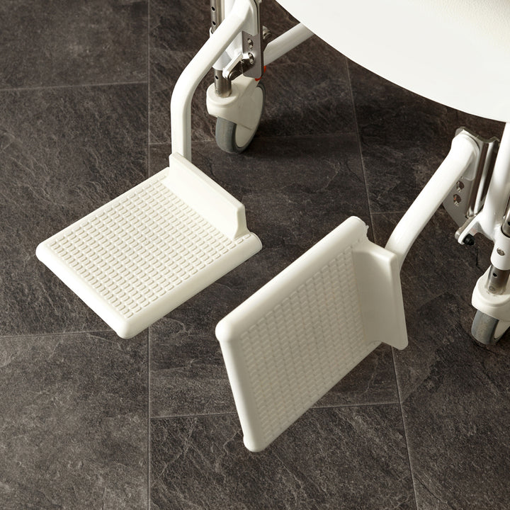 Flip up foot supports
 for etac clean commode chair