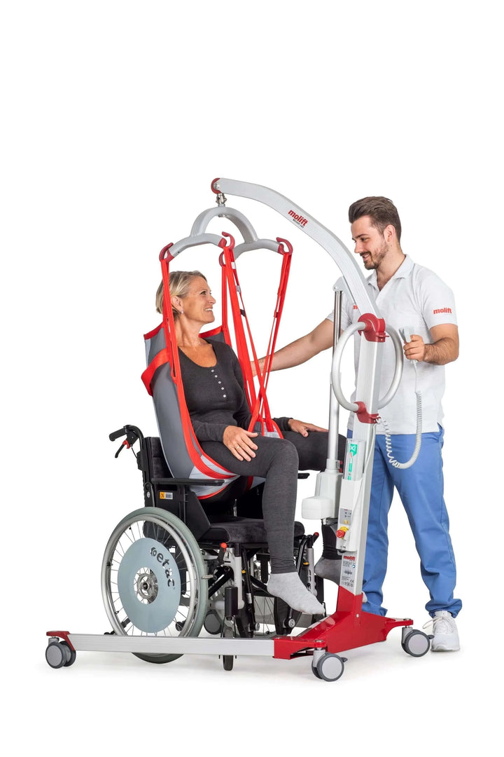 Molift - Mover 180 4-Point Sling Bar - patient being helped out of wheelchair using portable lift