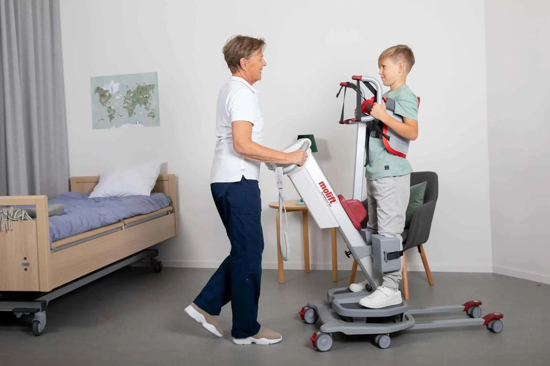 Molift - RgoSling Active being used by patient and their sit to stand aid and a nurse