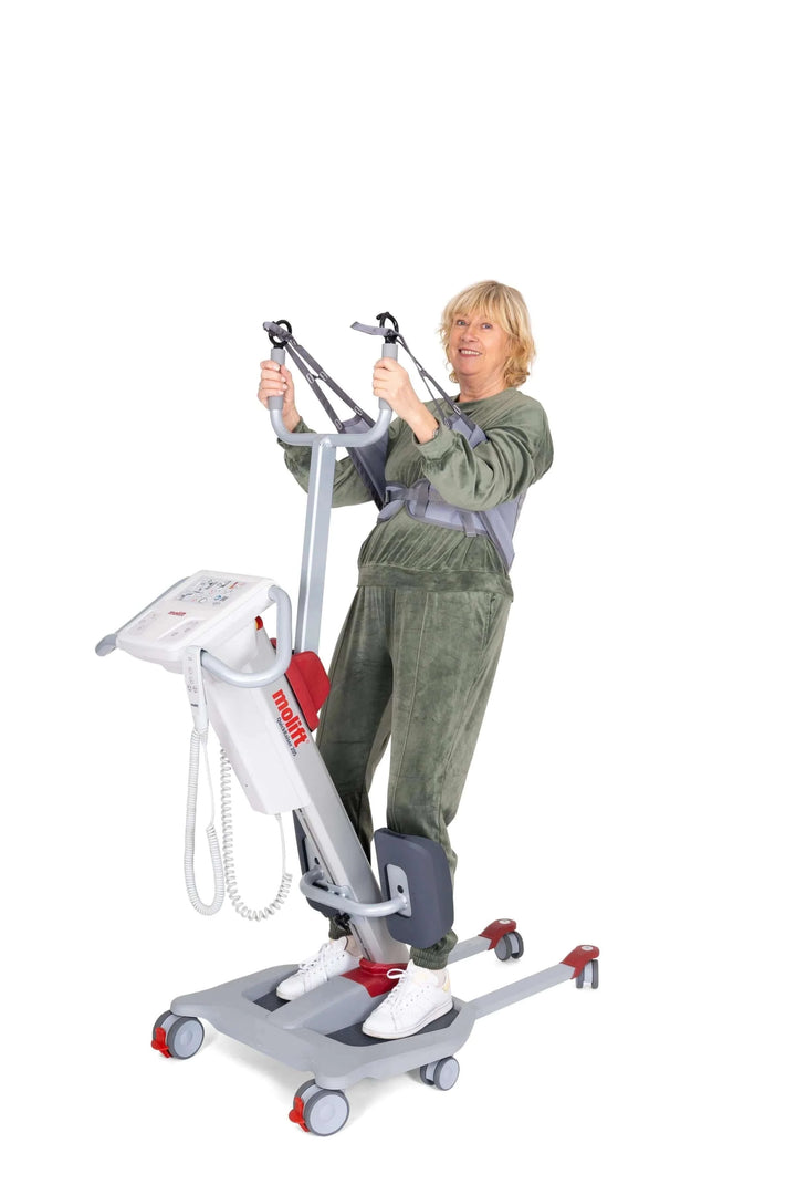 Molift - Quick Raiser 205 Sit-To-Stand Patient Lift - patient using it with white background