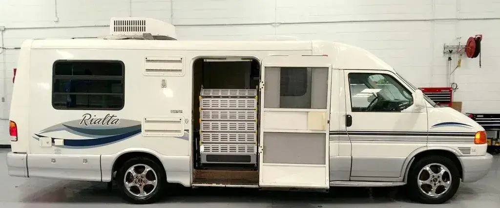 Roll-A-Ramp Powered Van Ramp for Mini and Full Size Van Ramps for AF1 and MF1 Ramps at Reliable Ramps being used with an RV