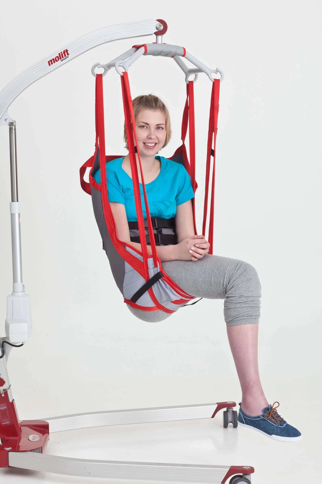 Molift - RgoSling Amputee Mediumback Padded Patient Sling being used by a patient in a lift