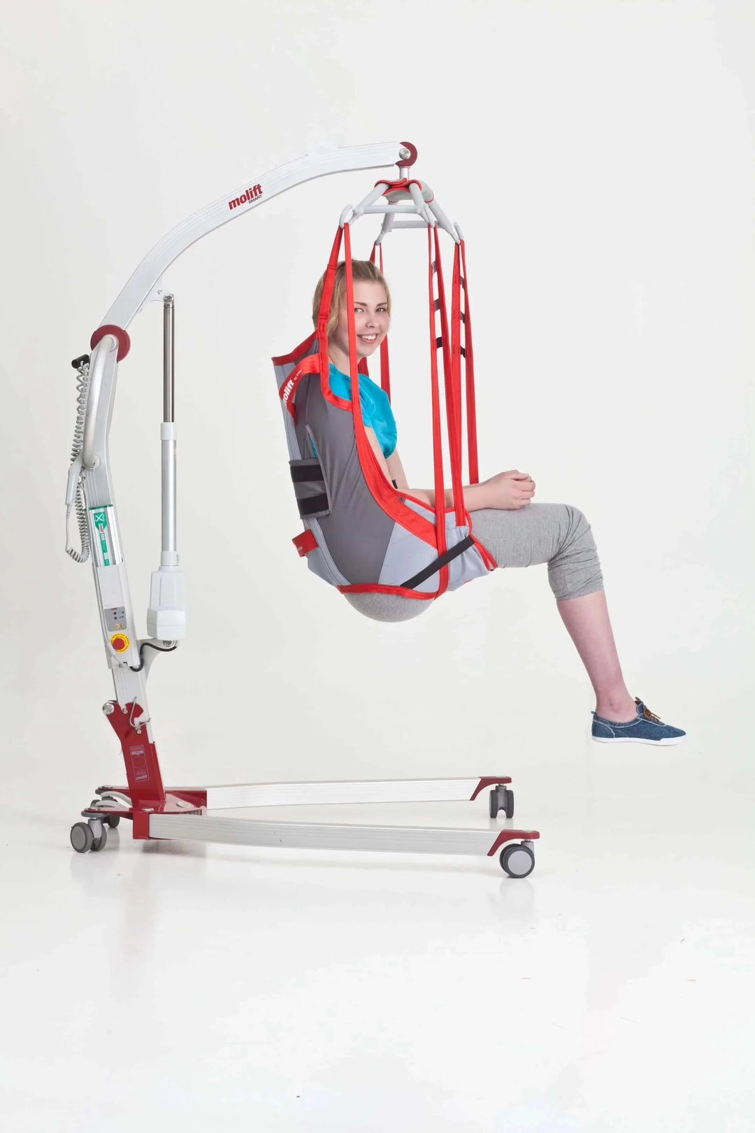 Molift - RgoSling Amputee Mediumback Padded Patient Sling being used by a patient in a lift
