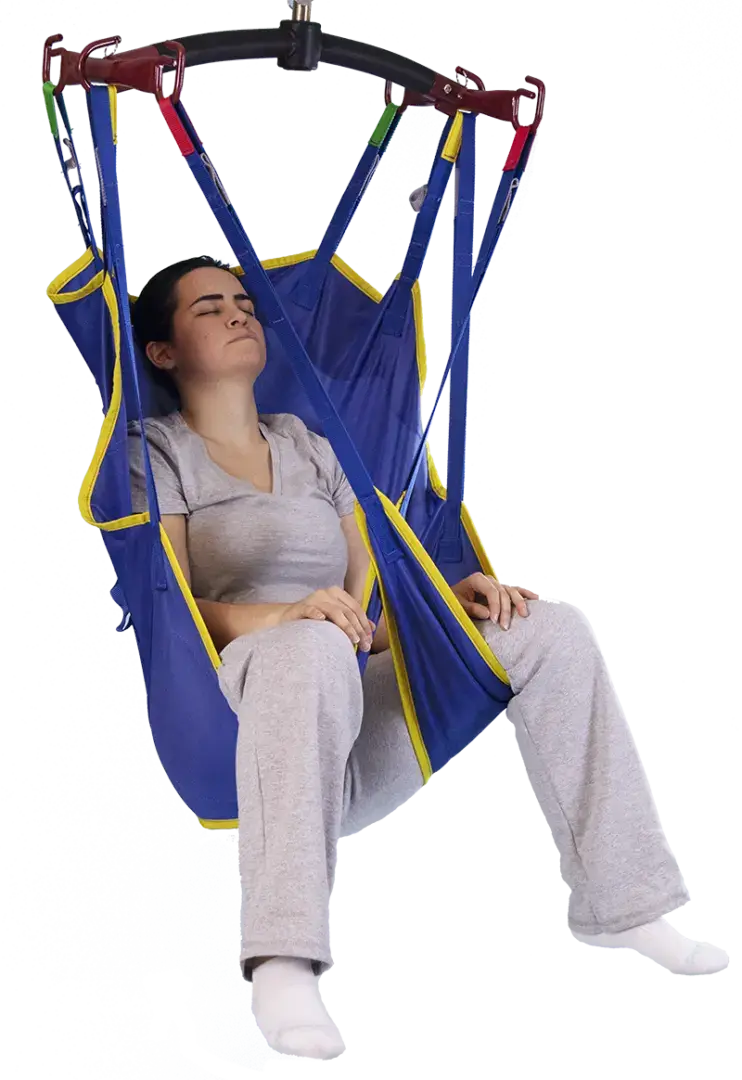 the bestcare univeral padded patient sling with head support from reliable ramps being used by a female patient.