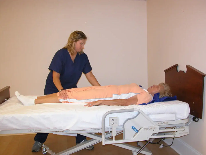  bestcare best transfer sheet being used by a patient laying down