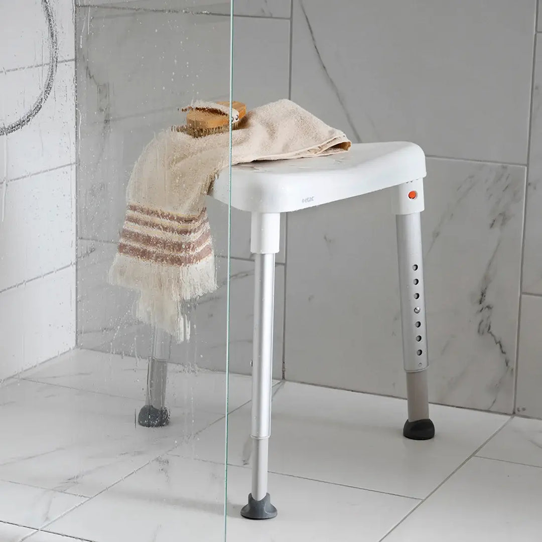 etac edge shower stool at reliable ramps in a shower