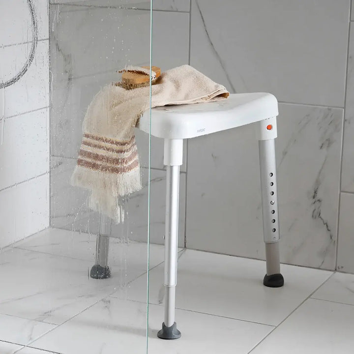 etac edge shower stool at reliable ramps in a shower