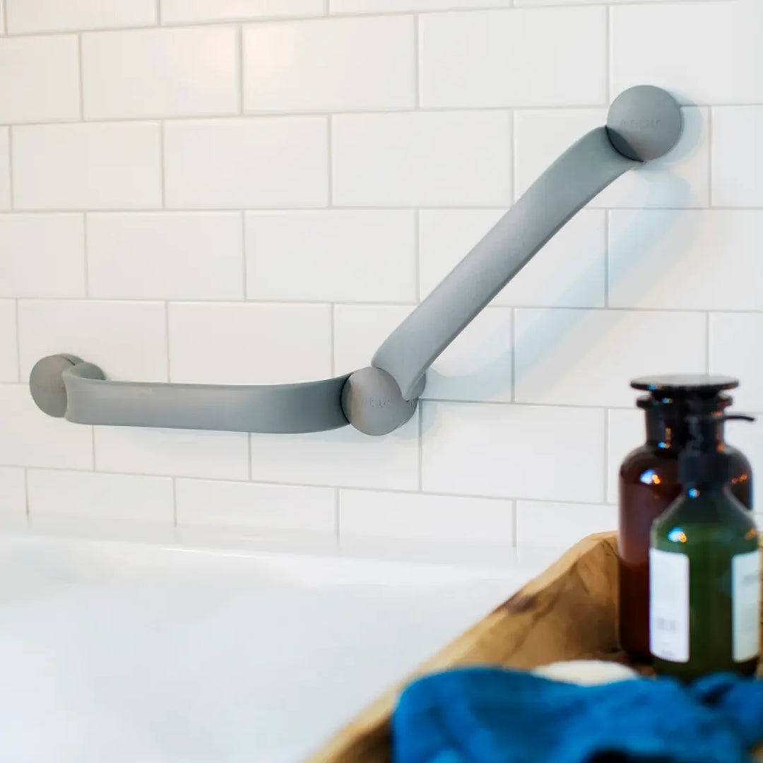 etac flex grab bar on reliable ramps grey on a white wall