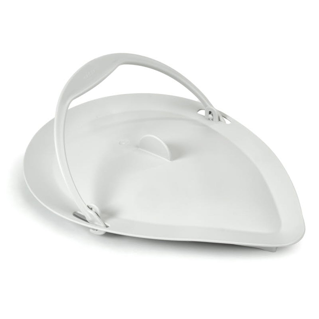 White ceramic pie dish with a handle on a white background