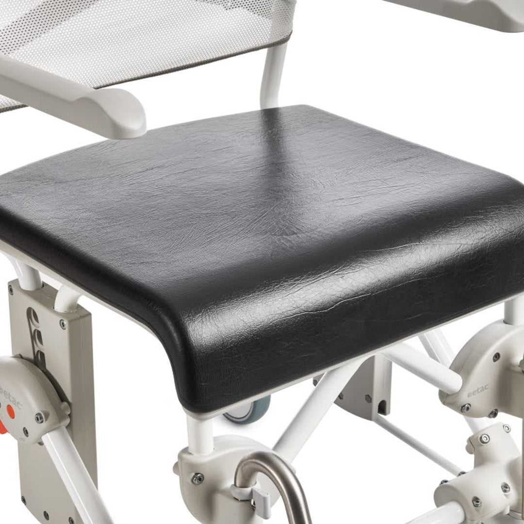 Black seat cover on a medical chair with white frame