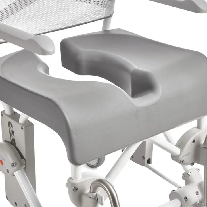 Gray medical examination table with a cushioned seat on a white background