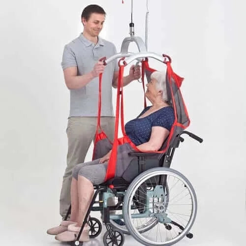 Molift - RgoSling Comfort HighBack Patient Sling being used by a patient and their nurse out of a wheelchair