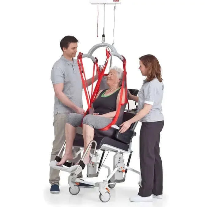Molift - RgoSling Highback Net Patient Sling being used by a patient and their nurses